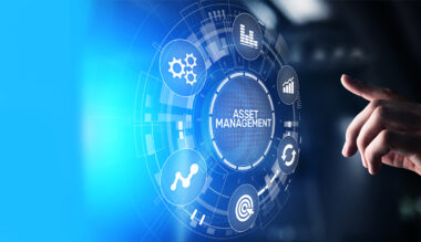 Alt text: Asset management concept with analytics icons and graphs on virtual screen
