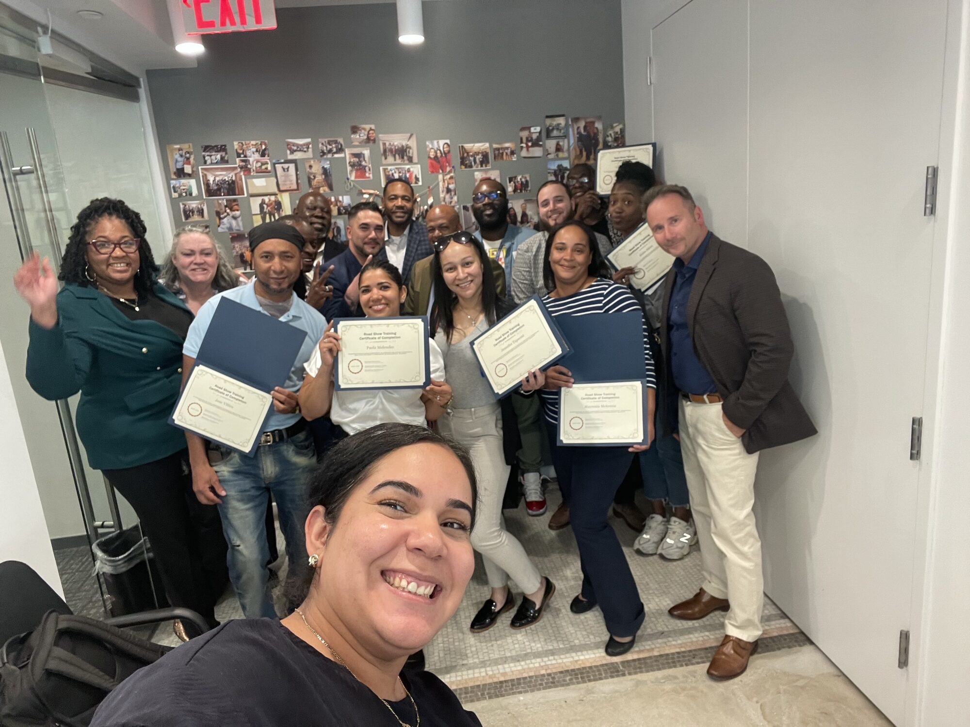 People holding certificates
